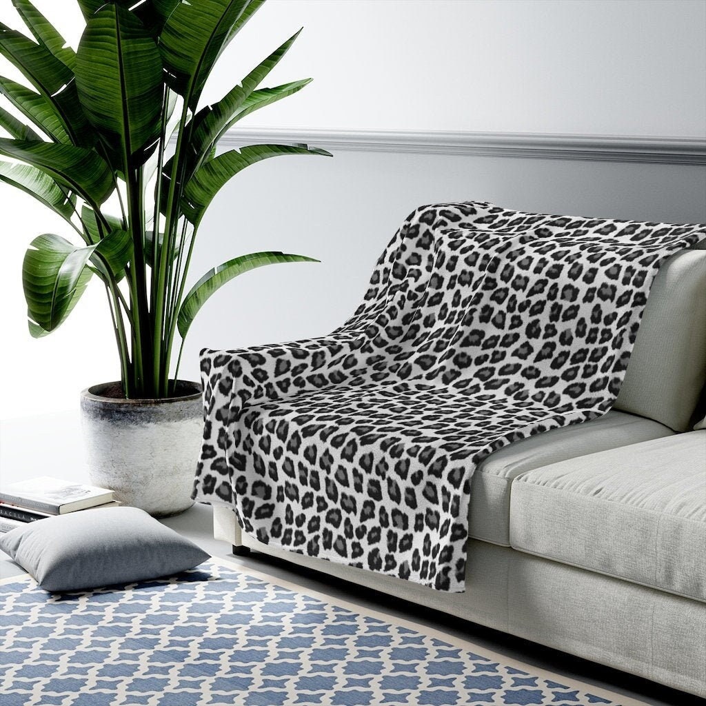 Snow leopard fleece blanket hotsell