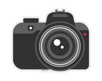May include: A black and gray camera with a large lens. The camera has a red dot on the right side.