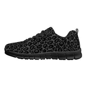 May include: Black sneakers with a leopard print design. The shoes have a white sole and black laces.