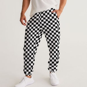 Pantalones de chándal a cuadros negros y blancos para hombre, bolsillos con cremallera a cuadros de carreras Forro de malla de secado rápido Joggers rompevientos ligeros para festivales con cintura elástica