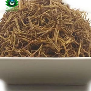 May include: A square white bowl filled with a mound of dried, thin, light brown herbal stems. In the upper left corner, a logo features a green lotus flower with a central eye and the text AWAKEN RELAXATION printed in green capital letters.