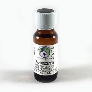 May include: A brown glass bottle with a white cap and label. The label reads "FRANKINCENSE BOSWELLIA SERRATA INDIA REDISTILLED 100% DISTILLED ESSENTIAL OIL 0.5 fl oz / 14.79 ml"