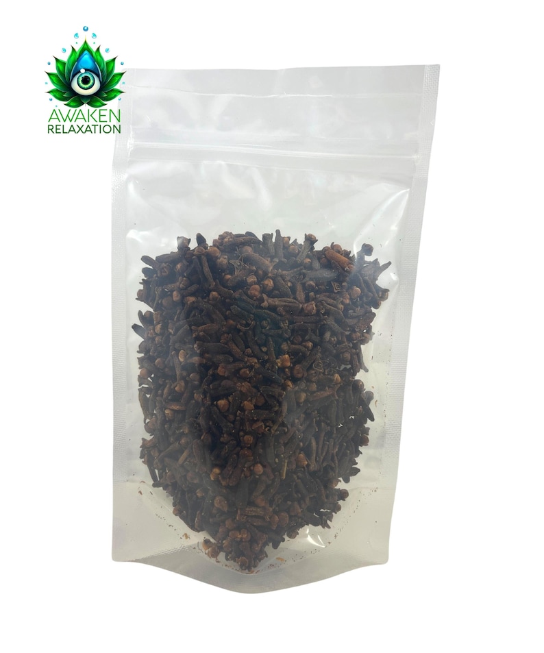 May include: A clear plastic bag filled with whole cloves, a common spice used in cooking and baking.