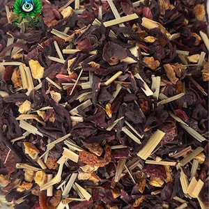 May include: Close-up of a blend of dried hibiscus flowers, orange peel, and lemongrass. The mixture is a vibrant red, orange, and brown.