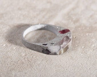 Fully- fashioned grey concrete  ring with pyrite, crystal, rose qartz and  bohemian garnet