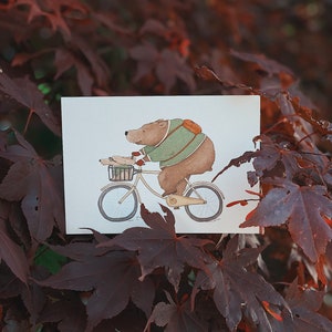 Carte postale *Radelraudis* . Chien . Ours. Vélo . Vélo. Amitié animale. rapide . Anniversaire des enfants. Visite à vélo. Un détour. en route