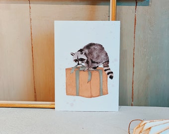 Postcard “Raccoon with a gift”. Christmas gift . cute . Christmas time . give . Birthday . to you . Poison day