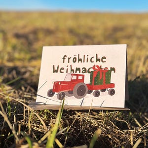 Wenskaart “Kerstbrancard” . Dorpskind. tractor. Landbouw. Dorp . speelgoed. Kerstmis . Fijne vakantie. Adventstijd