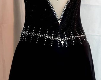 Black dress for skating Size 38 Chest 75-80 cm (29.5-31.5") Waist - 60-65 cm (23.5-25.5") Hips - 85-90 cm (33.5-35.5") Ready for shipping