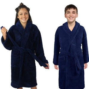 May include: Three navy blue bathrobes are displayed. Each robe has a shawl collar, long sleeves, and a matching belt. The robes are knee-length and have pockets. The models are standing on a white background.