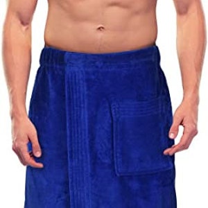 May include: A royal blue wrap-around towel with an elasticated waistband and a single patch pocket on the front. The towel features a textured fabric finish and is designed to be worn around the waist, providing coverage from the waist to the knees.