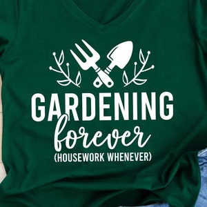 May include: A green t-shirt with a white graphic of gardening tools and the text "GARDENING forever (HOUSEWORK WHENEVER)".