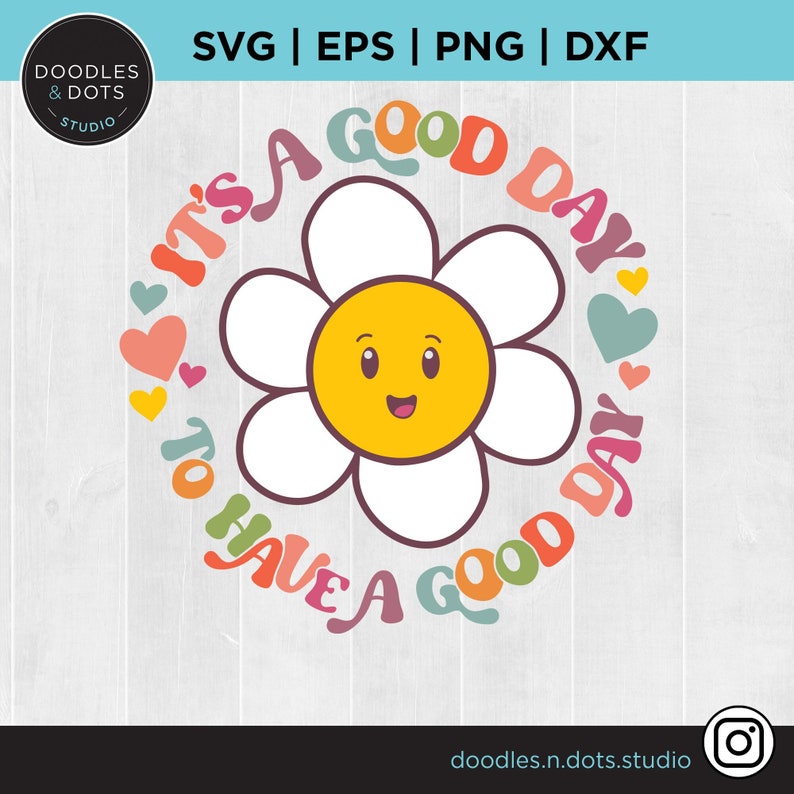 May include: A colorful graphic design with a daisy and the text "It's a good day to have a good day". The daisy has a yellow center with a smiling face and white petals. The text is in a rainbow of colors.