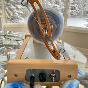 Spinning wheels. Electric spinning wheels. Electronic spinner. lazy kate. E-spinner