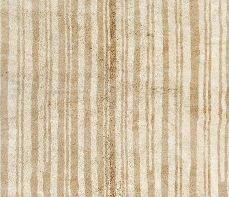 May include: A beige rug with vertical stripes of a slightly darker beige color.