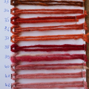 red orange and pink yarn colors