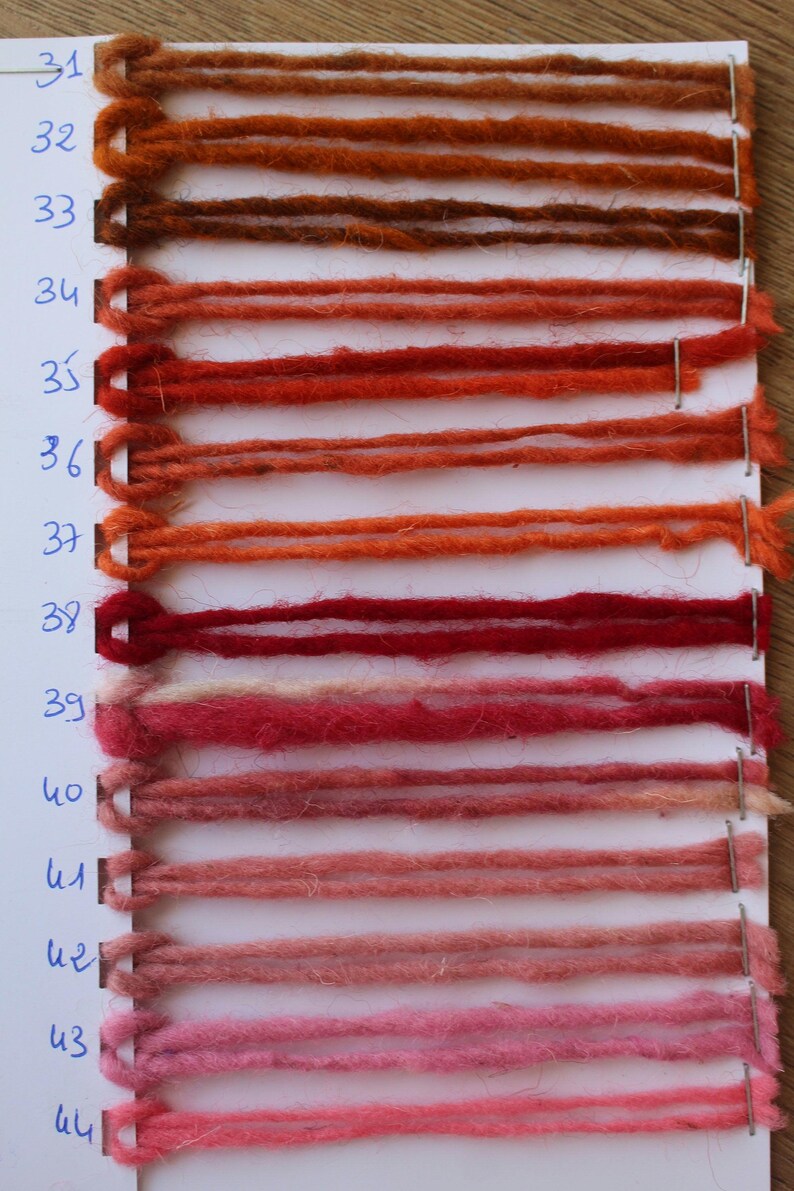 red orange and pink yarn colors