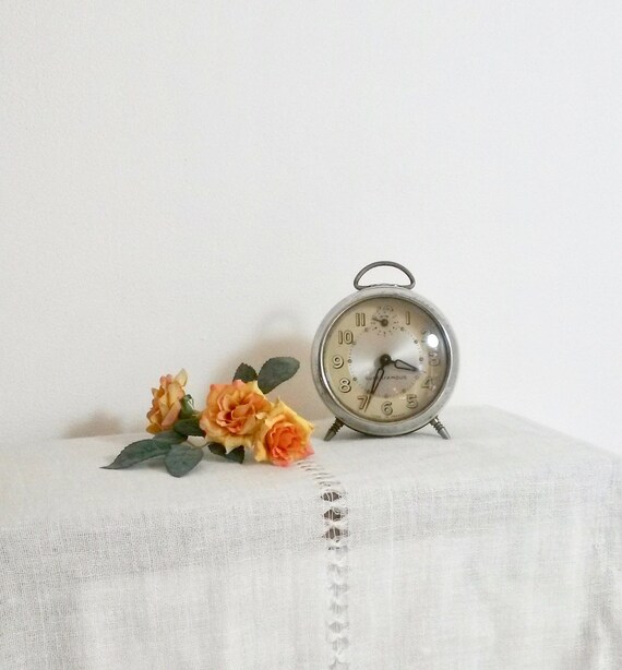 French Alarm Clock To Repair Round Table