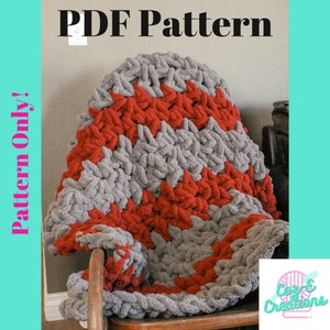 May include: PDF pattern for a crocheted blanket with a chevron pattern in red and gray yarn. The blanket is draped over a wooden chair. The text "PDF Pattern" and "Pattern Only!" are visible in the image.