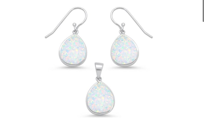 Fire white opal jewelry set with dangle earrings and matching pendant necklace. Real Sterling Silver setting and chain. Teardrop shaped. Perfect gift for Mother’s Day. The lab opal earrings have a sterling silver French wire.
