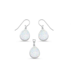 May include: A set of silver earrings and a pendant featuring white opal teardrop-shaped stones.