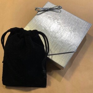 A silver foil box and bow are included making this a perfect gift for mom, daughter, wife or friend.