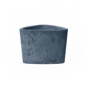 May include: A blue oval-shaped concrete planter with a rough, textured surface.