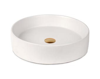 Lavabo de hormigón, hecho a mano, diseño de cuenco redondo, elegante y moderno para baño en Miami.