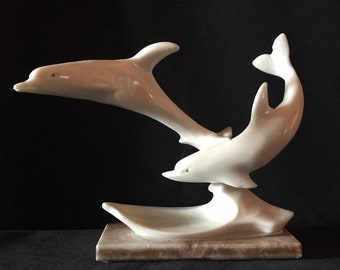 Vinyage Sculpture Of Two Dolphins