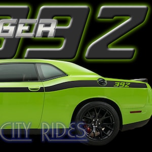 May include: Green Dodge Challenger with black racing stripes and 392 badging. The car is a side profile view. The text "Fits Challenger 2008-2023" and "Motor City Rides" are visible in the image.