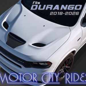 May include: White car hood with a black air intake. The text "Fits DURANGO 2018-2026" is displayed across the windshield. The words "MOTOR CITY RIDES" are at the bottom of the image.