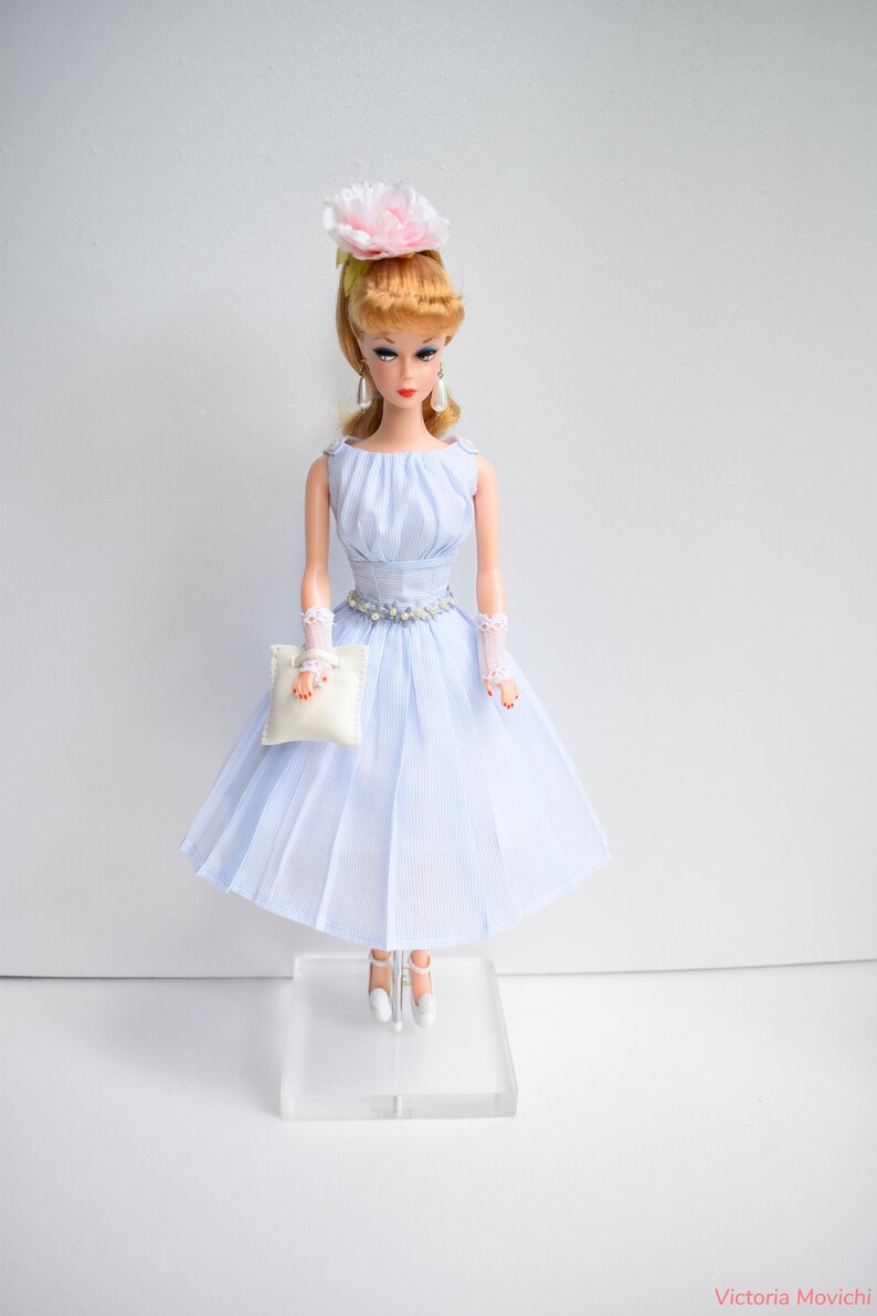 Blue lined dress with belt and petticoat purse earrings image 3