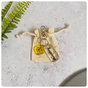 May include: A distressed wooden sign with the words "Welcome to our home" in white lettering. The sign has a rustic finish, ideal for adding a welcoming touch to a home's entrance.