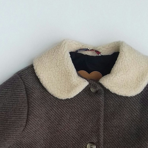 Manteau laine beige et col faux mouton