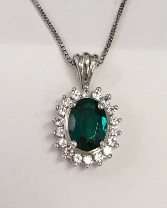 Synthetic emerald pendant in sterling silver - image 1