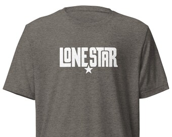 May include: A heather grey t-shirt with a white graphic of the word "LONESTAR" with a star underneath.