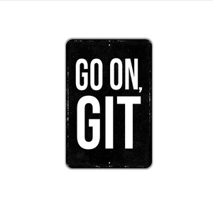 May include: A rectangular black metal sign with rounded corners and a distressed finish. The sign features the white text "GO ON, GIT" in a bold, sans-serif font. There are small mounting holes visible at the top and bottom center edges.