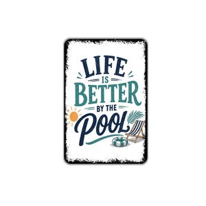 May include: A rectangular metal sign with a white background and distressed black edges. The text reads LIFE IS BETTER BY THE POOL in dark blue and teal. Graphics include a small orange sun, a palm leaf, a lounge chair, and a striped pool float.