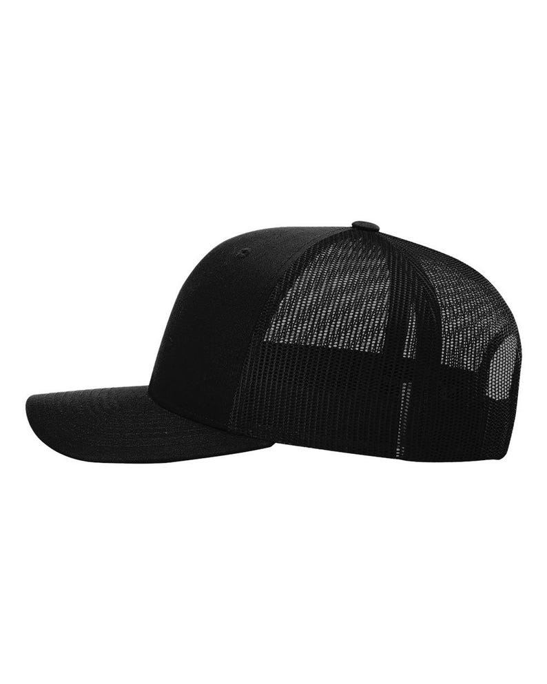 May include: A black trucker hat with a curved brim. The front panel is solid black, while the back features a black mesh for ventilation. The hat has a standard six-panel design and a snapback closure for an adjustable fit.