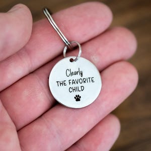 Clearly The Favorite Child Pet ID Tag | Funny Dog Or Cat Collar Tag | Pet Humor Gift | Spoiled Fur Baby | Sassy Pet Personality Joke Tag