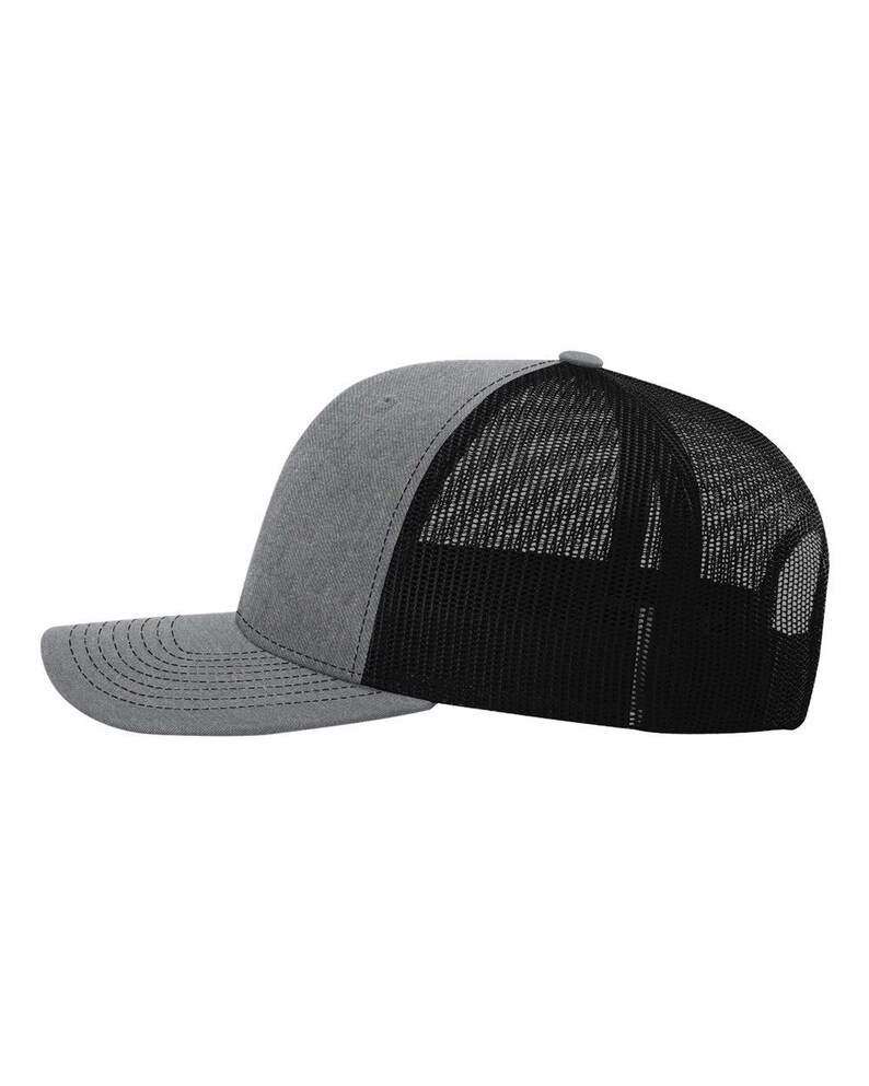 May include: A gray and black trucker hat with a curved brim. The front panels and brim are gray, while the back is black mesh. The hat has a snapback closure and a small gray button on top.
