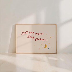 A framed poster with the text "Just one more story please..." and a small illustration of a crescent moon and stars.
