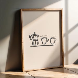 May include: A framed wall art print featuring a black ink sketch of a moka pot and two coffee mugs on a light beige background. The text "one for you" is written above the first mug, and "one for me" is written above the second mug.