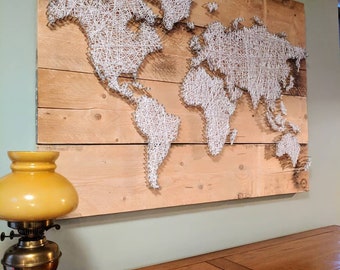 Rustic scaffold board map of the world. nail and white string wall mounted art on rough timber, heavy duty unique centrepiece stringart