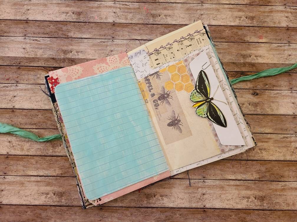 This is a soft cover journal built from Kraftex and fabric Etsy