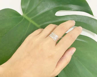 Handy rings or rings of simple fine phalanxes crafted in solid silver hammered 7-room