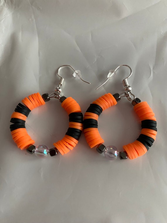 Handmade, Black & Orange Clay Disc With Black Square Beads and a  Translucent Bead Dangle Earrings on Silver Hooks 
