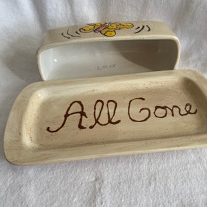 Yellow butterfly butter dish