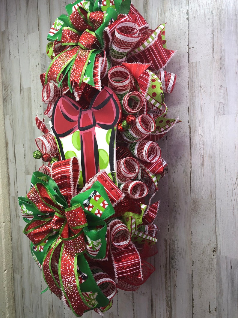 Christmas paint stick swag with wooden present sign Etsy