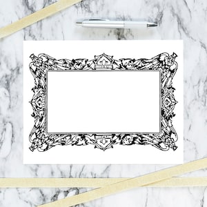 May include: A black and white printable frame with a decorative ornate design. The frame is empty and ready to be filled with a photo or artwork.